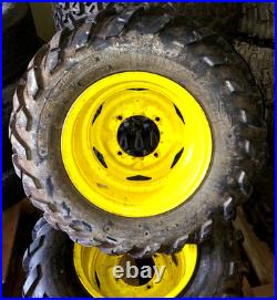John Deere Gator 12 Yellow Steel Wheel 4 Lug withANCLA M/T 25x8-12 Tire